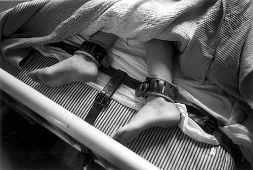 Mary_Ellen_Mark_Feet_Strapped_Down_in_Bed_1976_c1976_1858_41
